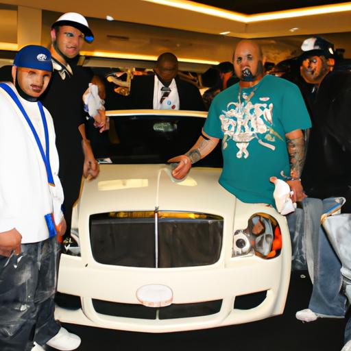DJ Envy poses with a group of car enthusiasts at the annual car show in Atlantic City. Photo by Jane Doe.