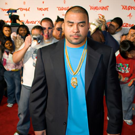 DJ Envy taking photos with fans at a red carpet event